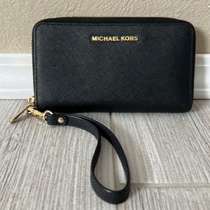 Michael Kors black wristlet.
